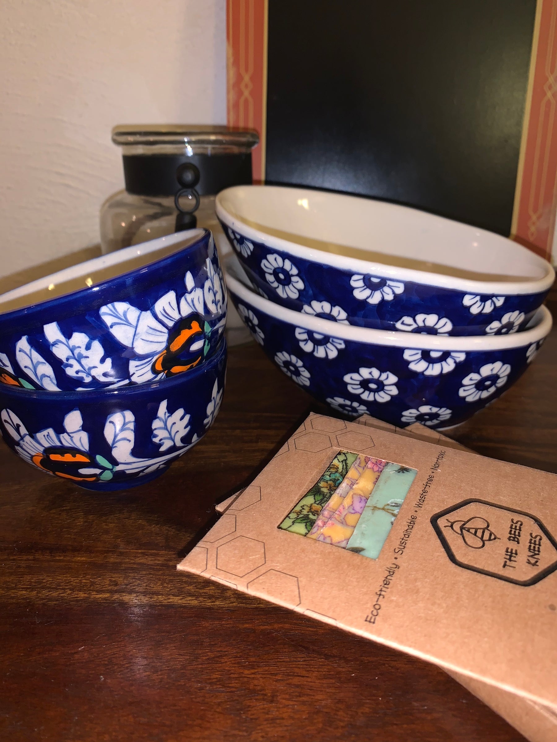 An image of hand painted ceramic bowls and wax wraps